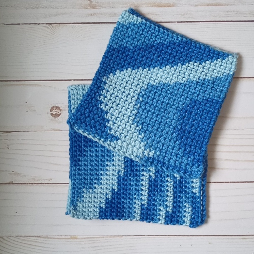 Handmade crocheted cotton pot holders. 2 pot holders in the set.